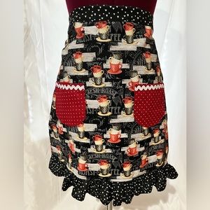 Coffee lap apron with ruffles and pockets.